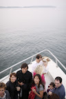 Here, guests and the bride mix and mingle at the front of the ferry boat.