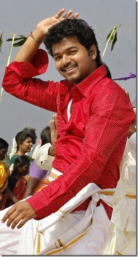 vijay-velayutham-stills-with-red-color-dress