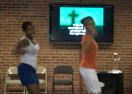 Two students perform a dance for the graduation ceremony.(Photo by: Kenrick Nobles)