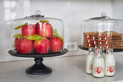 Back to School: Pink lady apples with handcrafted leaf and caterpillar decorations in black ceramic cake stand & dome (Martha Stewart for Macy's), mini milk bottles with farm fresh milk Back to School: Pink lady apples with handcrafted leaf and caterpillar decorations in black ceramic cake stand & dome (Martha Stewart for Macy's), mini milk bottles with farm fresh milk