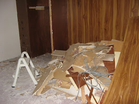 the pile of rubble, consisting of one interior wall and most of one triple-layer ceiling