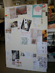 Here's our development board that includes inspiration, actual items (like the save the date), and a photo of our flowergirl model.