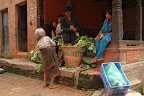 Old lady addressing people in the street