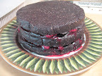 A pre-frosting look at the assembled cake. A pre-frosting look at the assembled cake.