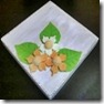 Tampa com flor de biscuit