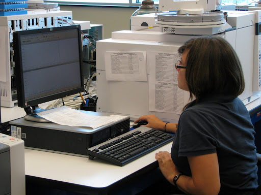 A toxicology technician working on identifying the content of evidence. (Photo credit: Jeremy Shreckhise)