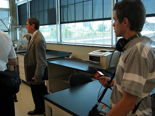 KSMU's Samuel Crowe on the tour of The Crime Lab. (Photo credit: Jeremy Shreckhise)