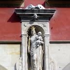 2005-07-05 011 Krakow, Poland - statue on wall along street.JPG