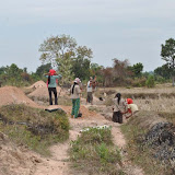 Women villagers starting work on canal.