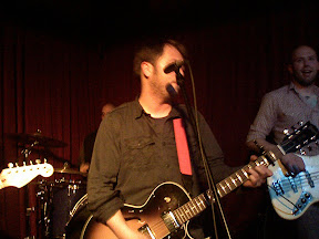 David Sparrow hides from the microphone.