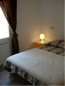 Bedroom 2: double bed 150 x 200 cm, built-in wardrobe, 1 window, heating