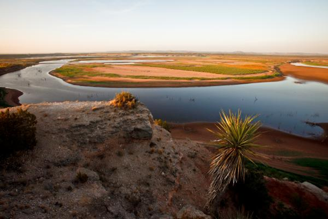 A barren and dry Lake E.V. Spence is at 0.7% capacity and was once a busy recreational getaway, but now provides a small trickle of drinking water to nearby town Robert Lee, 13 August 2011. Michael Paulsen / Houston Chronicle