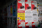 Posters from different groups calling for protest at the Thessaloniki Expo.