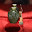 A traditional Chinese Perfume Bottle, also known as a Snuff Box.  The body is carved from a green piece of Jade, while the lid is almost white in its colouring.   This bottle dates to circa 1910s to 1920s.  There is a bat carved into one side and a 3 character inscription on the reverse.