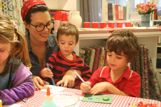 Leigh Pennebaker from Marvelous Kiddo (http://marvelouskiddo.blogspot.com/) and her boys create some button cards.