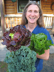 Mary and our CSA take! Greens galore!