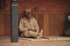 Man with white feet resting