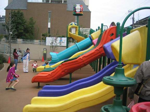 The many slides of Robot Park. That's Maria in the blue jacket, with Eidan next to her.