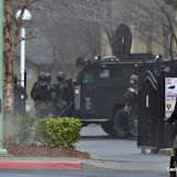 An apartment complex was locked down Tuesday morning as SWAT officers moved in on a building in the complex. Three persons of interest were detained without incident in connection with a homicide that took place in the parking lot of the complex the night before. News_120131_HomicideSWAT_#121202