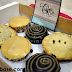 Six pastries in a box from UnmisCAKEable by Jaja: White Temptation, Dark Decadence, and Classic Apple Pie