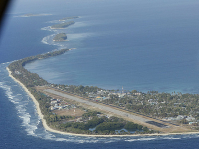 Aerial view of Funafuti, the main island of the nation state of Tuvalu, 13 October 2011. The atolls are suffering a severe drought and water shortage, coupled with contaminated ground water due to rising sea levels. The governments of Australia, New Zealand and the U.S. are providing desalination plants to alleviate the critical water shortage for some 10,000 islanders. Alastair Grant / The Associated Press