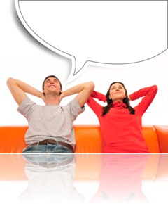 Young couple sitting on sofa and dreaming Young couple sitting on sofa and dreaming