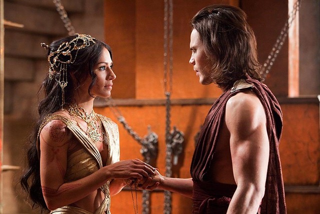 L to R: Dejah Thoris (Lynn Collins) and John Carter (Taylor Kitsch)