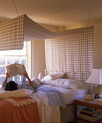 You can create a dramatic canopy with a length of fabric like we did here.