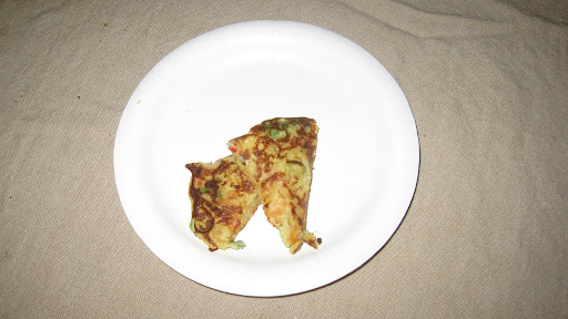 My Brooklyn Kitchen (a food blog that also does events) served delicious bin dae duk, a Korean mung bean pancake made with vegetables, shrimp and bacon. Check out their take on the Lucky Rice fest: http://mybrooklynkitchen.com/2010/05/03/my-first-big-event-lucky-rice/