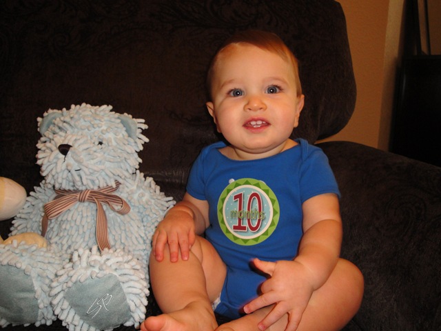 [5.%2520%2520Knox%2520smiling%2520with%2520bear%252010%2520months%255B3%255D.jpg]