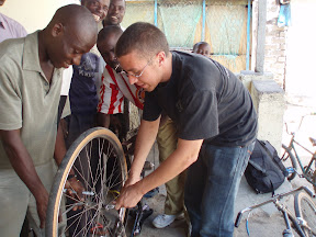 I tried to help out some of the many bicycle repair guys in town. Biking is by FAR the main means of transportation - often the ONLY way to get to the villages in the bush, and the cheapest way for those with time to get even into Mwanza [25 miles away -