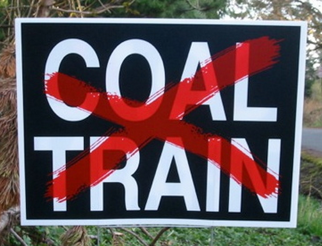 A yard sign has 'Coal Train' crossed out with a red X. A coalition of Washington state cities and tribes opposes shipping large volumes of coal through the state to a 'superport' for export to China. Photo: seattlemet.com 