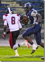 MORNING JOURNAL/SAM GREENE
Titans wide receiver Rashod Berry carries a pass during the first quarter in the game between the Lorain High School Titans and the Shaw High School Cardinals at George Daniel Field in Lorain , Ohio on Friday, Sept. 21, 2012. MORNING JOURNAL/SAM GREENE
Titans wide receiver Rashod Berry carries a pass during the first quarter in the game between the Lorain High School Titans and the Shaw High School Cardinals at George Daniel Field in Lorain , Ohio on Friday, Sept. 21, 2012.