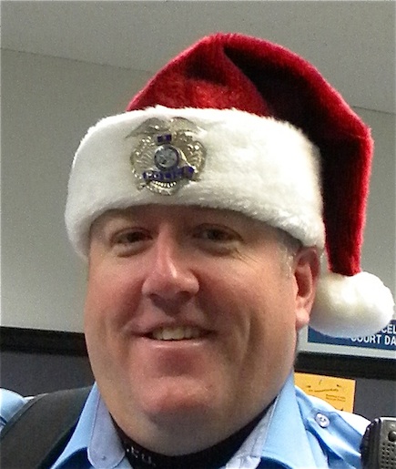 police man in Santa hat.jpg