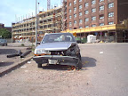 Scrap vehicle in the street Scrap vehicle in the street