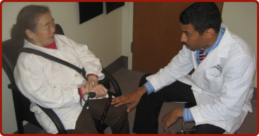DrMoshe Lewis with Patient.png DrMoshe Lewis with Patient