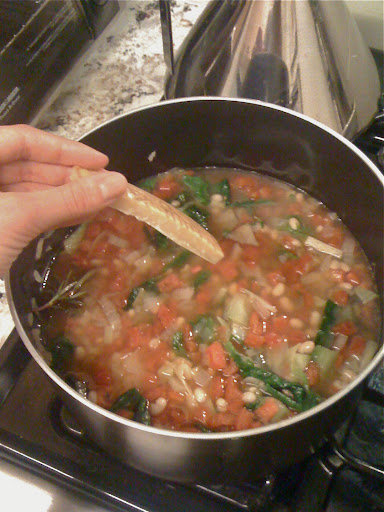 On top of that, I added 4 cups of vegetable broth, 2 cans of small white beans (drained), and a can of diced tomatoes (drained). Plus, the secret ingredient, which instantly improves any homemade soup: A parmesan rind. I let that all simmer for half an hour. On top of that, I added 4 cups of vegetable broth, 2 cans of small white beans (drained), and a can of diced tomatoes (drained). Plus, the secret ingredient, which instantly improves any homemade soup: A parmesan rind. I let that all simmer for half an hour.