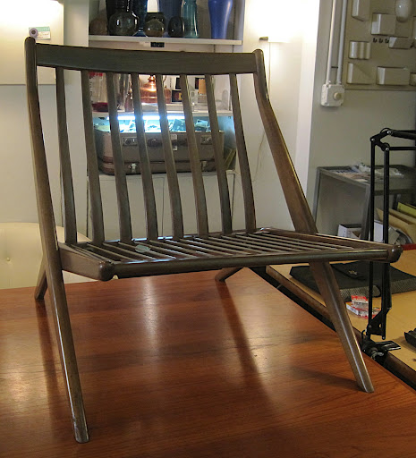 I imagined it ebonized and re-cushioned.