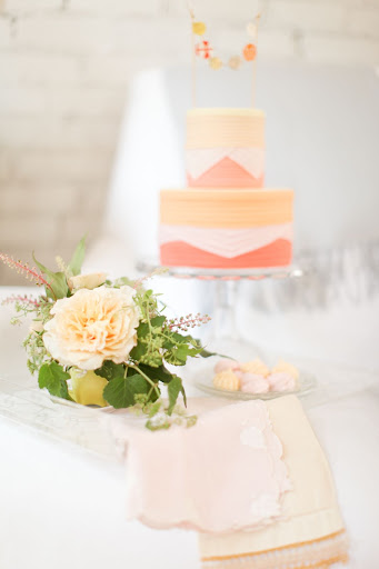 One lush peach blossom wrapped in vintage handkerchiefs makes a simple yet stunning bouquet.