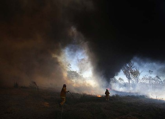 Rapid spread: a bushfire races through small farms in the north-west Sydney suburb of Ebenezer, August 2011. Nick Moir / smh.com.au