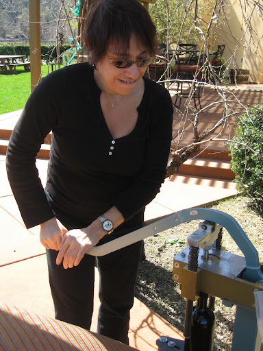 Sandy then got to put her own cork in her bottle by pulling down on this crank.  It made a wooshing sound when it was firmly inside.