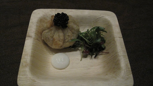 This is a fried dumpling filled with uni, a.k.a. sea urchin, and topped with caviar.  It sure beat theordinary shrimp-and-pork variety.
