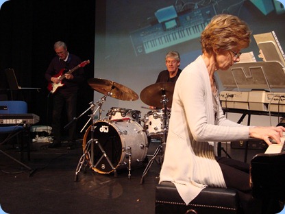 Denise Gunson on grand piano, Ian Jackson on drums and Brian Gunson on guitar. Photo courtesy of Peter Littlejohn. Denise Gunson on grand piano, Ian Jackson on drums and Brian Gunson on guitar. Photo courtesy of Peter Littlejohn.
