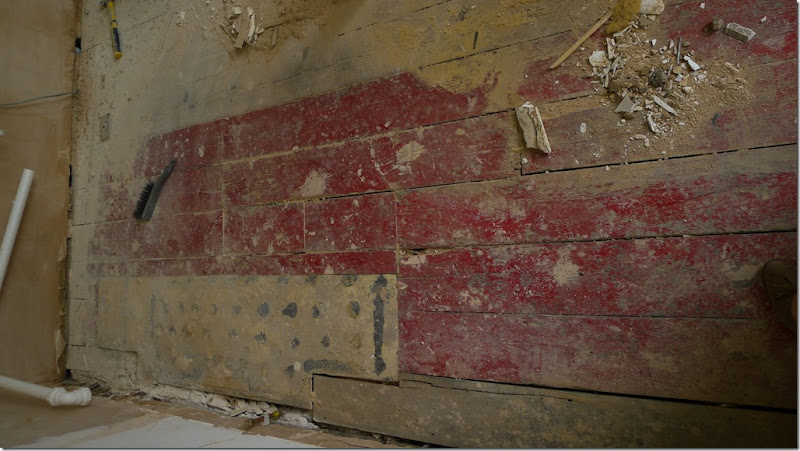 9 found 1800s red floorboards under kitchen