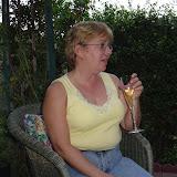 Cindy enjoys the wine and company.