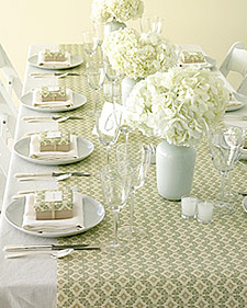 Use gift wrap to create a chic runner at your shower. (marthastewartweddings.com) Use gift wrap to create a chic runner at your shower. (marthastewartweddings.com)