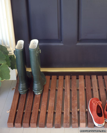 Place a rough mat (coir, wood, or rubber) outside for wiping off mud and snow and an absorbent mat inside to soak up moisture. Place a rough mat (coir, wood, or rubber) outside for wiping off mud and snow and an absorbent mat inside to soak up moisture.