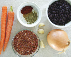 Carrots, quinoa, garlic, onion, and black beans make for a delicious soup!