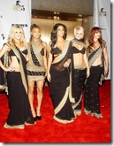 R&B quintet Pussycat Dolls walk the red carpet at Conde Nast Media Group’s 4th Annual Fashion Rocks in black saris