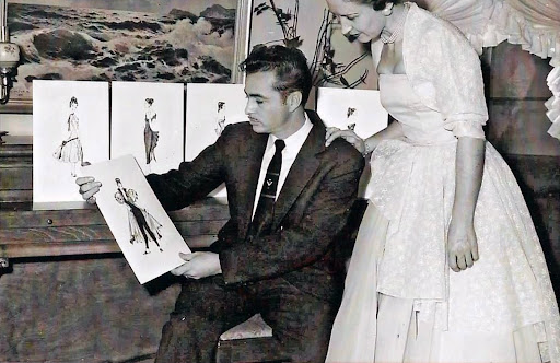 Dick Du Puis presenting his designs to a customer at her home in Santa Ana, California in the 1950's.